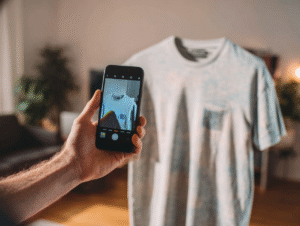 u4782959326_person_with_a_mobile_phone_scanning_a_t-shirt_at__37fb8522-bd41-40b7-b8c7-3897a6259381_1